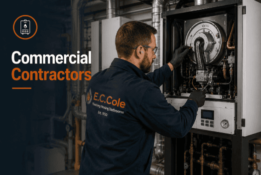 An E.C. Cole engineer fixes a boiler in an industrial facility.